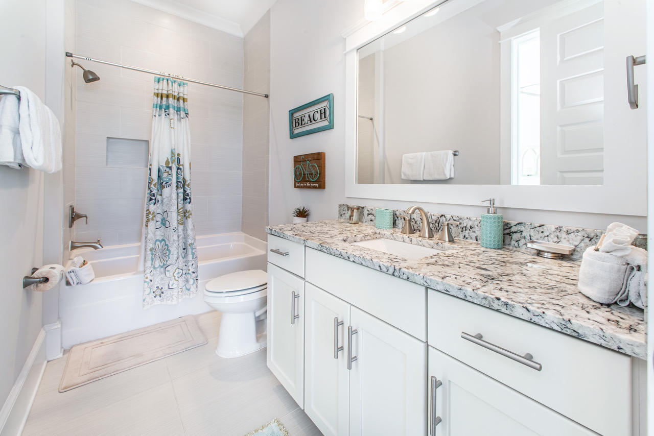 9 West Chester St Inlet Beach Inlet Beach, FL 32461 - Photo 27 of 54 a bathroom with a granite countertop sink a toilet and shower