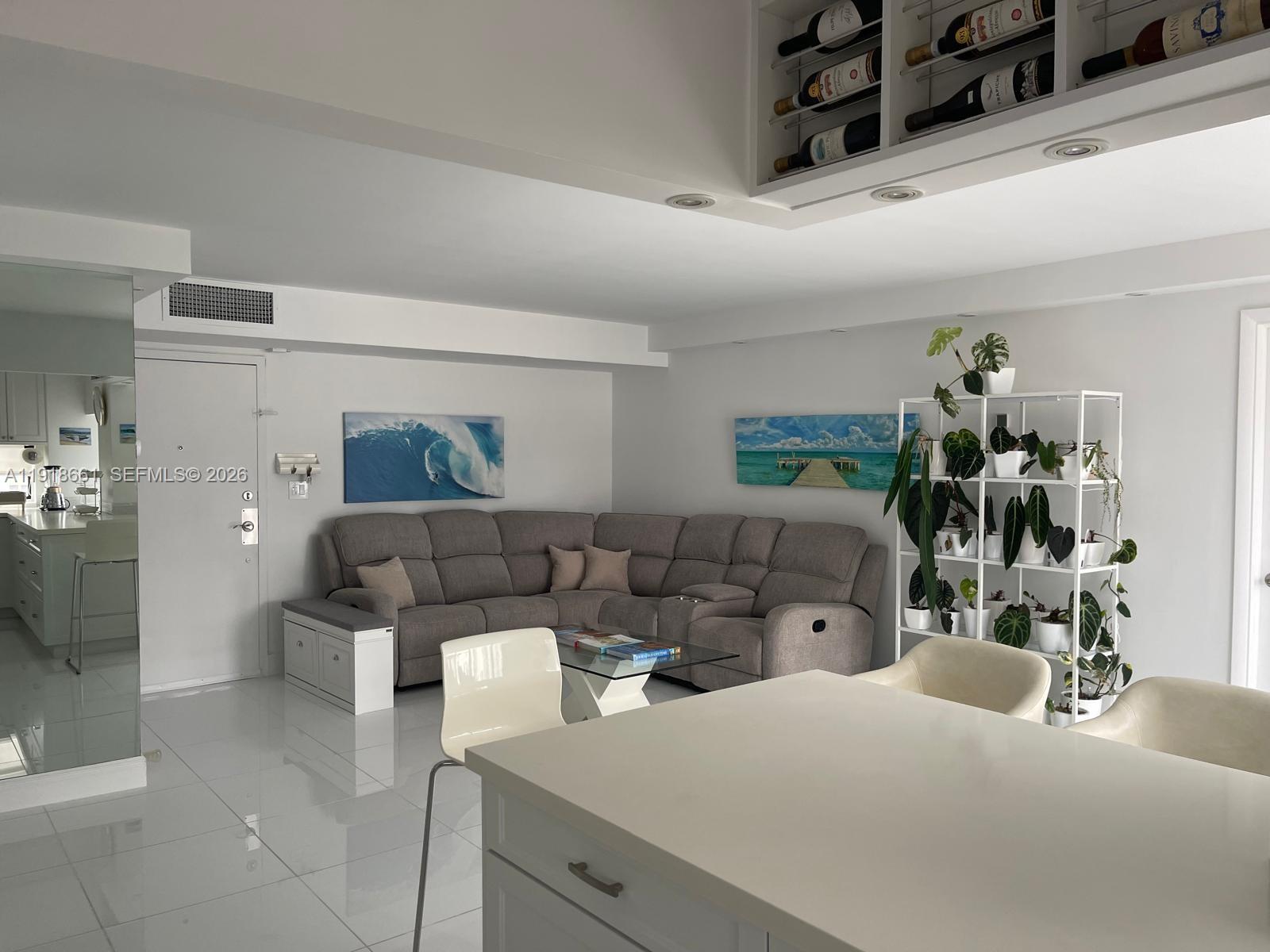 16909 North Bay Road, Unit 716 Sunny Isles Beach, FL 33160 - Photo 7 of 26 a bedroom with furniture and a mirror