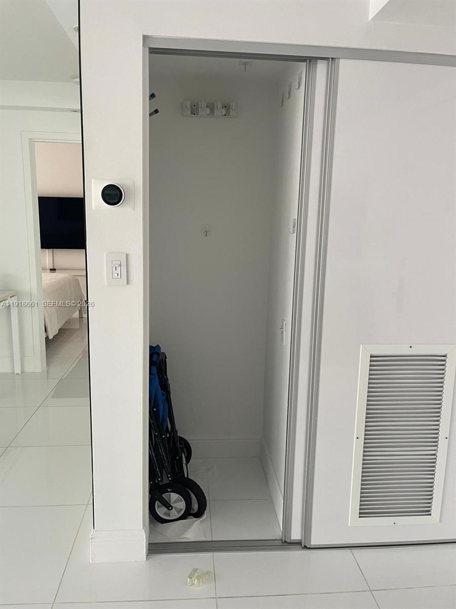 16909 North Bay Road, Unit 716 Sunny Isles Beach, FL 33160 - Photo 9 of 26 a bathroom with a shower