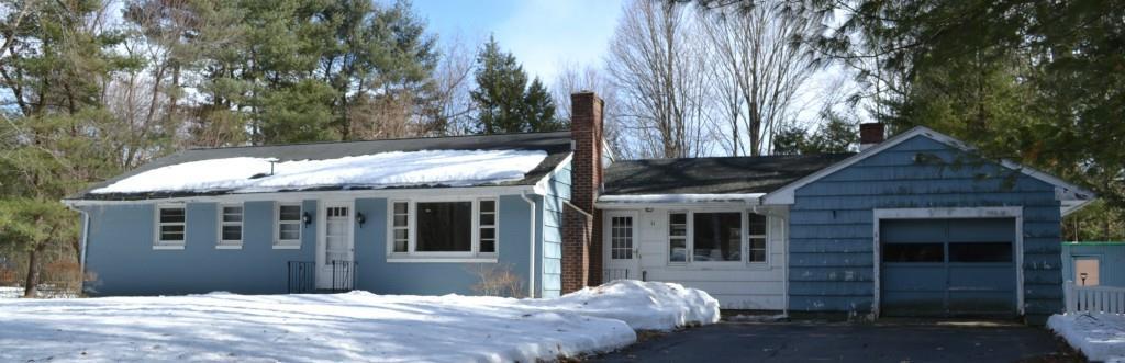 11 Crest Road Granby, CT 06035 - Photo 1 of 1 a front view of house with yard