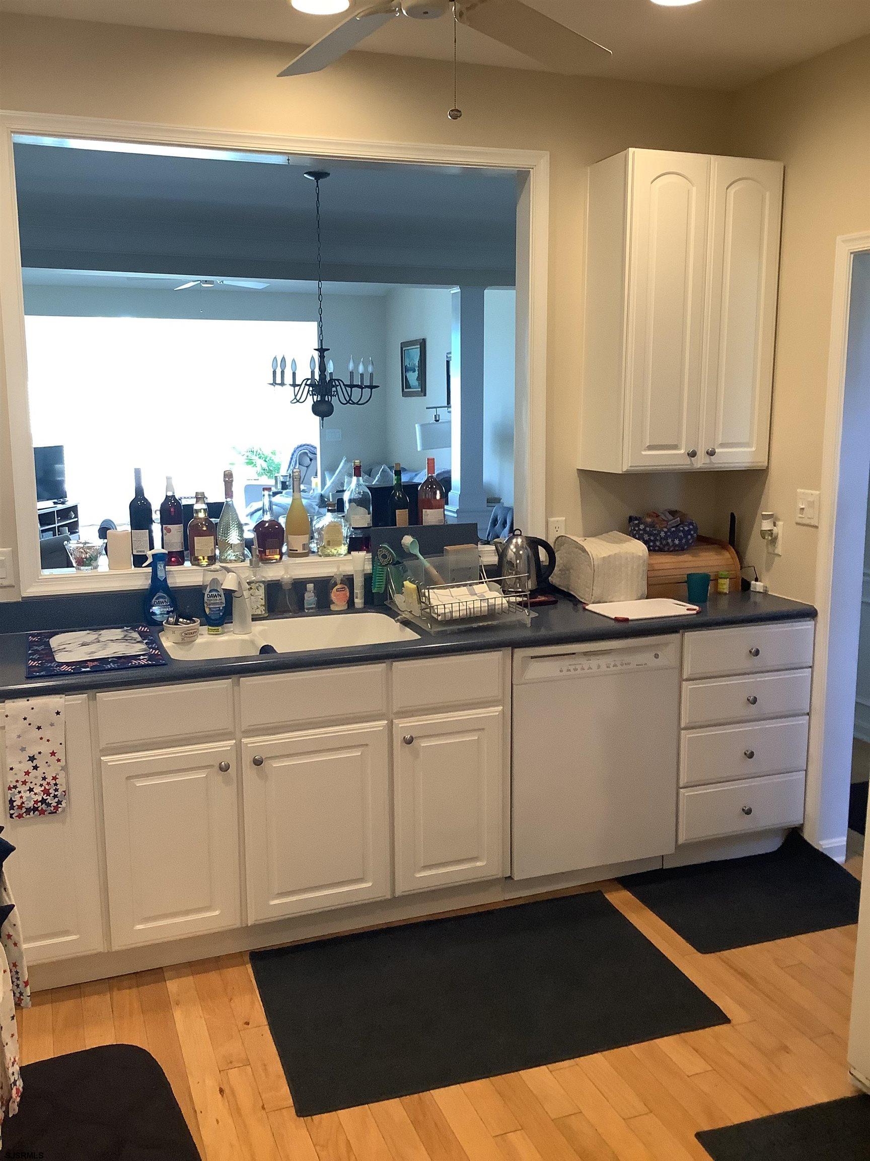 1731 South Shore Road, Unit 128 Marmora, NJ 08230 - Photo 5 of 13 a kitchen with a sink and cabinets