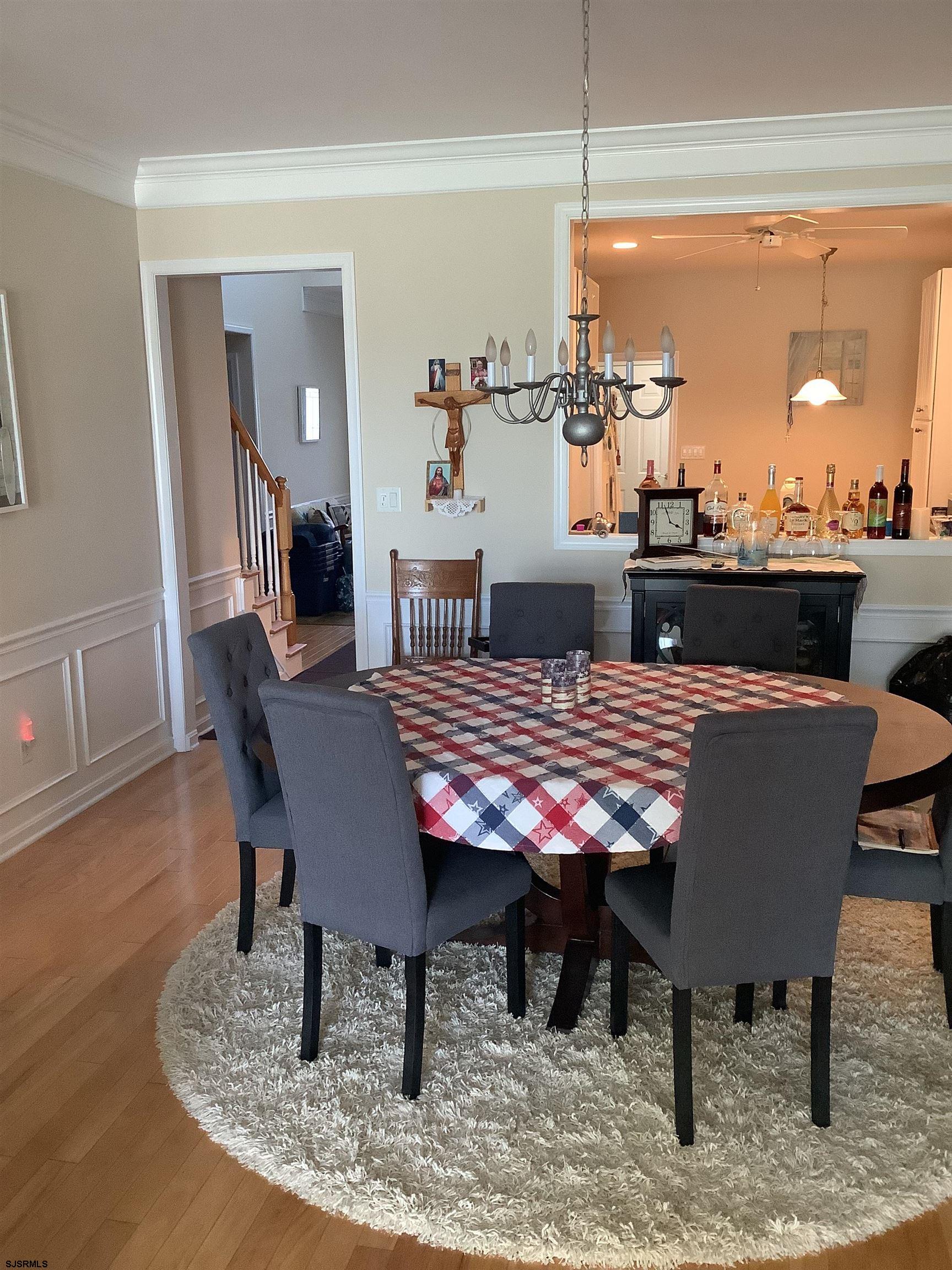 1731 South Shore Road, Unit 128 Marmora, NJ 08230 - Photo 7 of 13 a view of a dining room with furniture