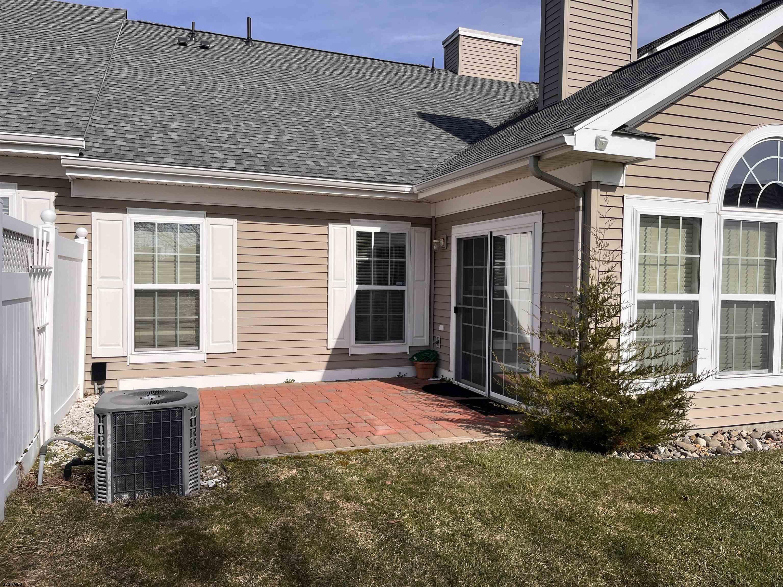 1731 South Shore Road, Unit 128 Marmora, NJ 08230 - Photo 10 of 10 a view of a house with backyard porch and sitting area