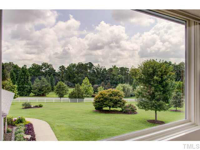 6705 Green Rise Road Hillsborough, NC 27278 - Photo 16 of 24 a view of a golf course with a garden