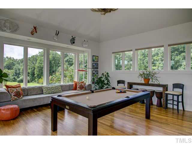 6705 Green Rise Road Hillsborough, NC 27278 - Photo 17 of 24 a view of a livingroom with furniture and window