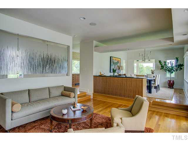 6705 Green Rise Road Hillsborough, NC 27278 - Photo 5 of 24 a living room with furniture and a large window