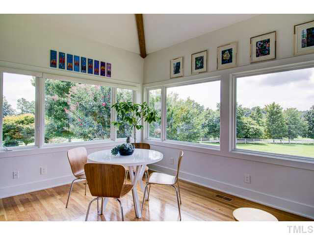 6705 Green Rise Road Hillsborough, NC 27278 - Photo 8 of 24 a view of a dining room with furniture window and outside view