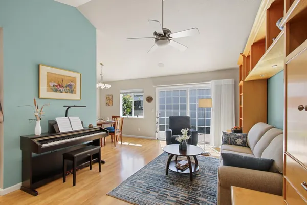 a living room with furniture and a window