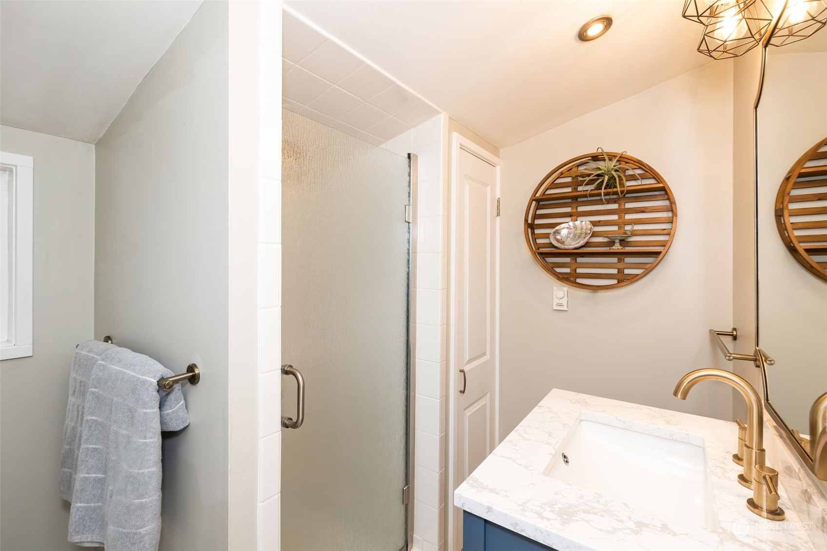 2016 Madrona Point Bremerton, WA 98312 - Photo 23 of 36 a bathroom with a sink and a mirror