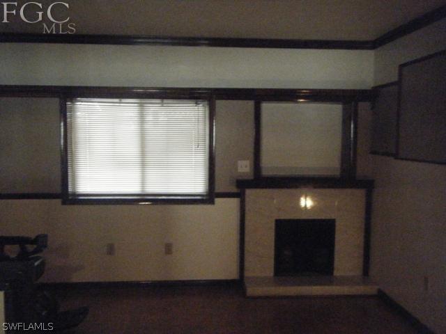 500 Oregon Road West Lehigh Acres, FL 33936 - Photo 3 of 24 a view of an empty room with a window