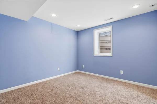 an empty room with a workbench