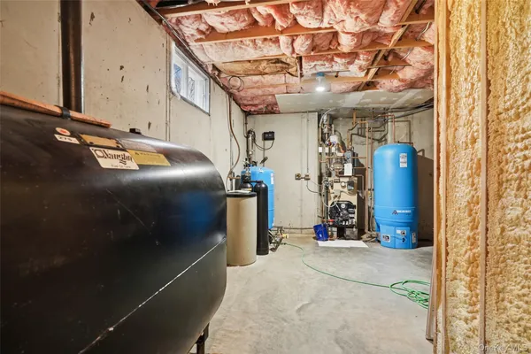 a view of an empty room with stairs