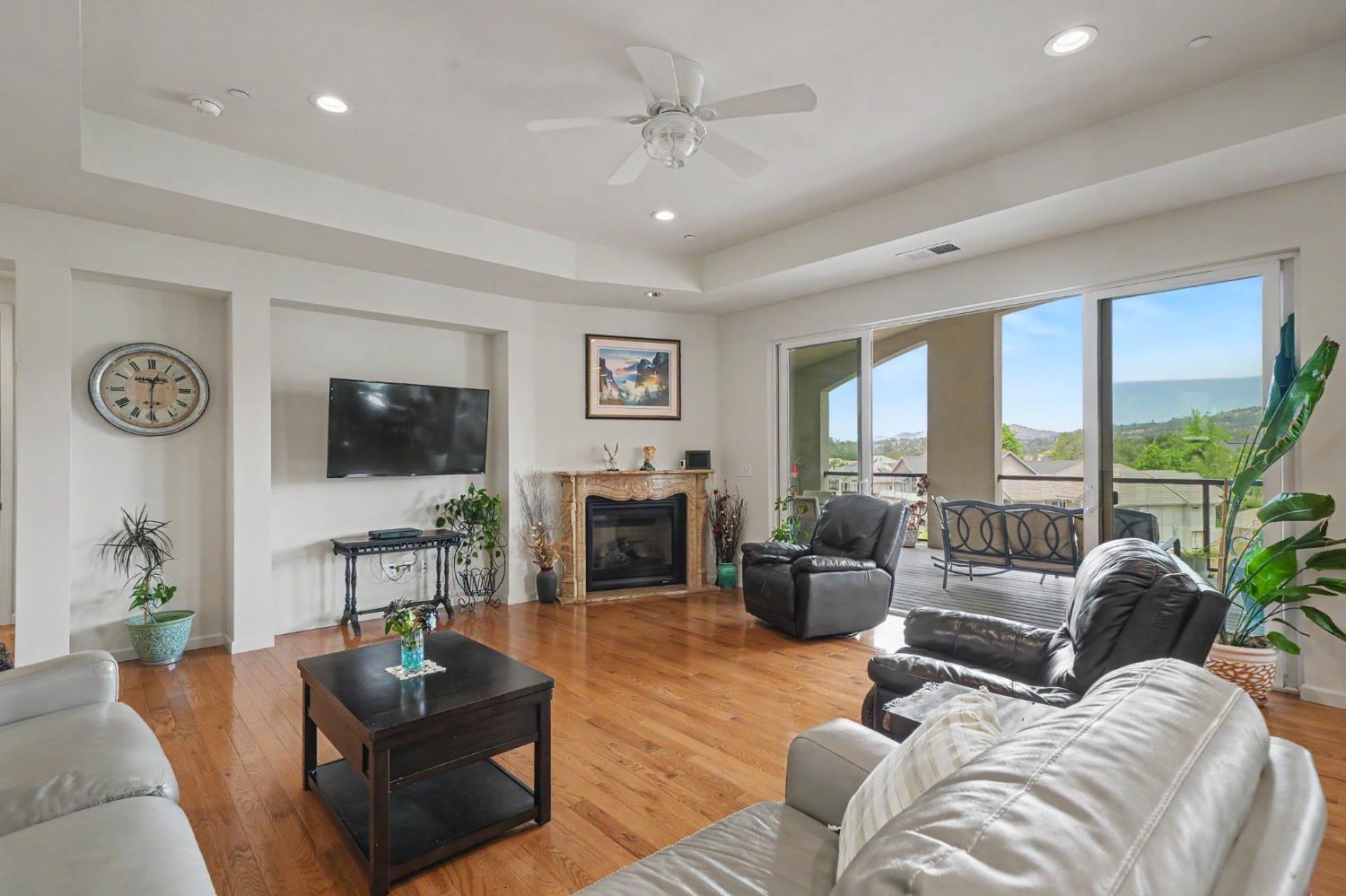 6066 Bluff View Road Copperopolis, CA 95228 - Photo 25 of 96 a living room with furniture flat screen tv and a large window