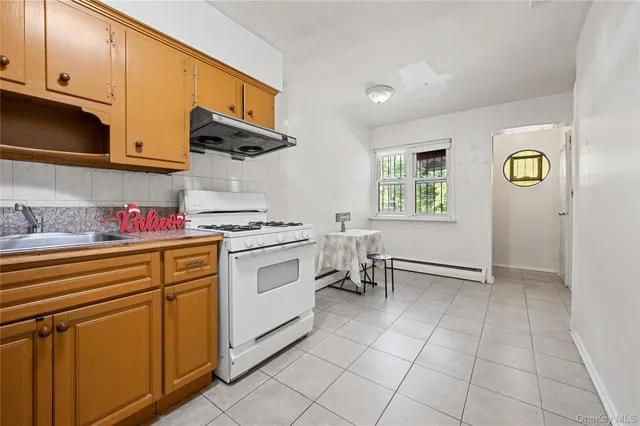 $1,138,000 | 152-10 Peck Avenue | Queensboro Hill