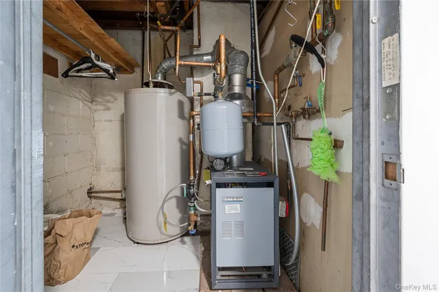 a water heater on the side of a wall