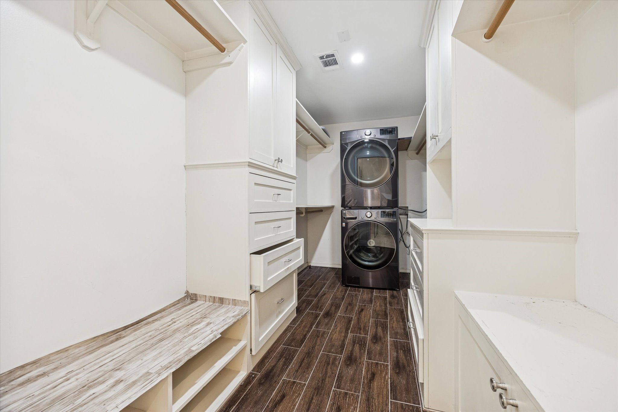 1624 Branard Street Houston, TX 77006 - Photo 21 of 25 a view of a closet with storage and utility