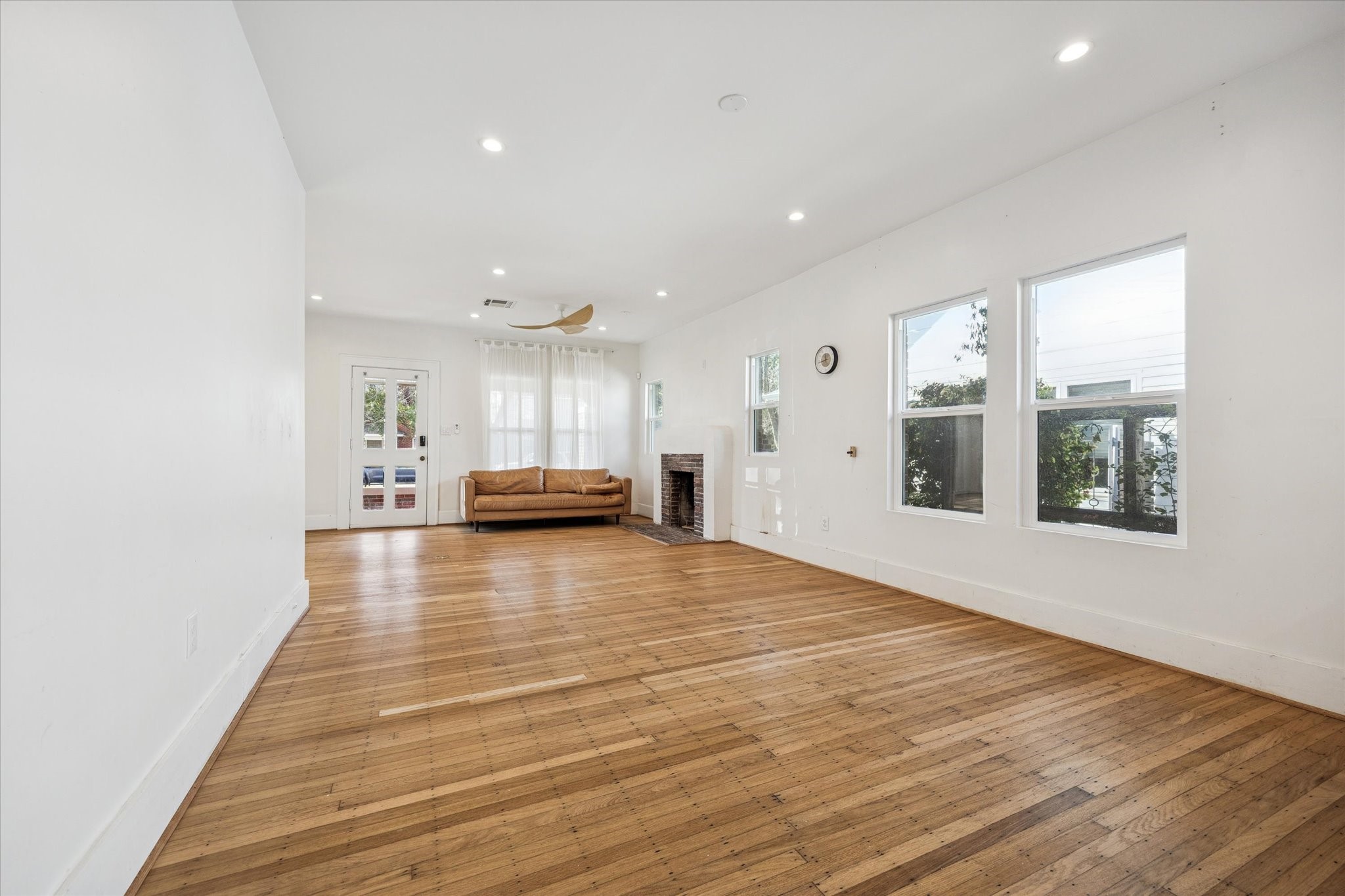 1624 Branard Street Houston, TX 77006 - Photo 10 of 25 a view of kitchen and hall with wooden floor