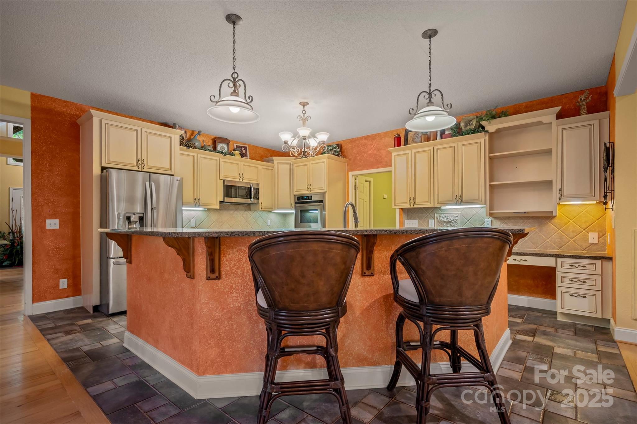 768 White Oak Lane Tryon, NC 28782 - Photo 13 of 48 a dining room with granite countertop furniture and a chandelier