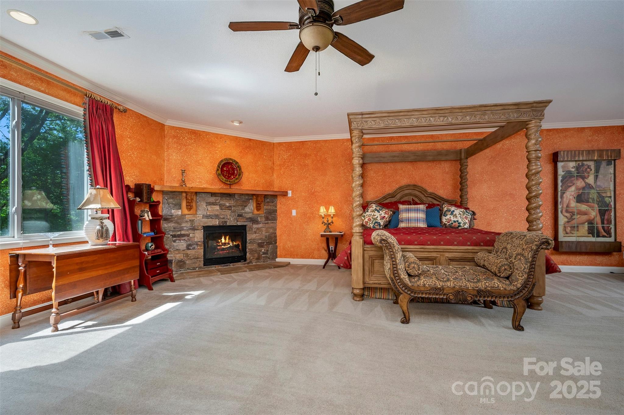 768 White Oak Lane Tryon, NC 28782 - Photo 22 of 48 a bed room with a bed and a fireplace