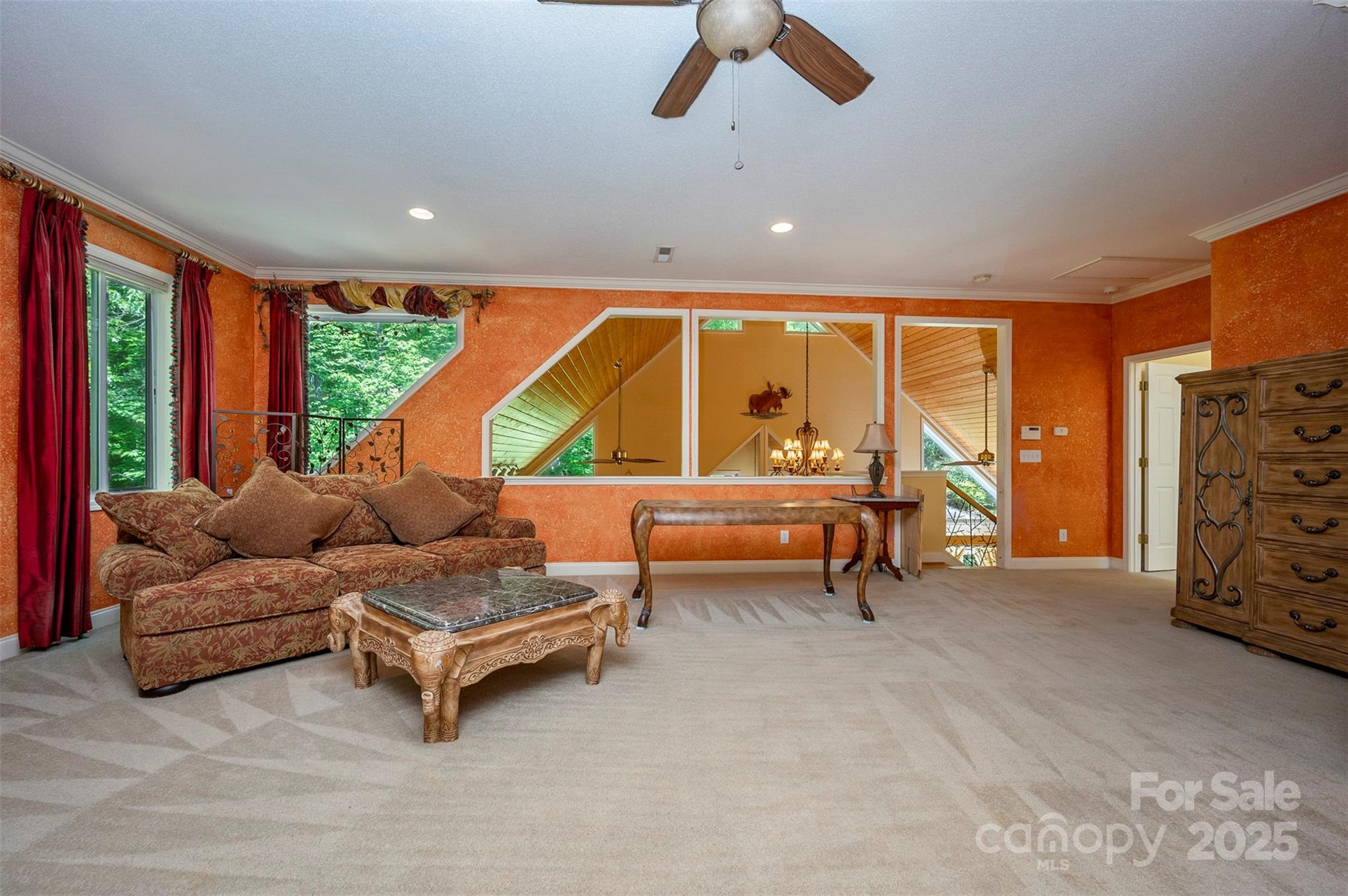 768 White Oak Lane Tryon, NC 28782 - Photo 23 of 48 a living room with furniture and a large window