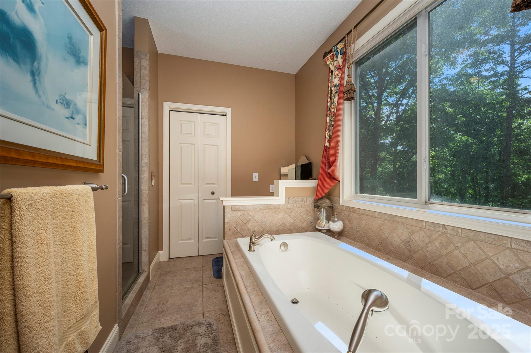 768 White Oak Lane Tryon, NC 28782 - Photo 26 of 48 a bath room with a tub and shower