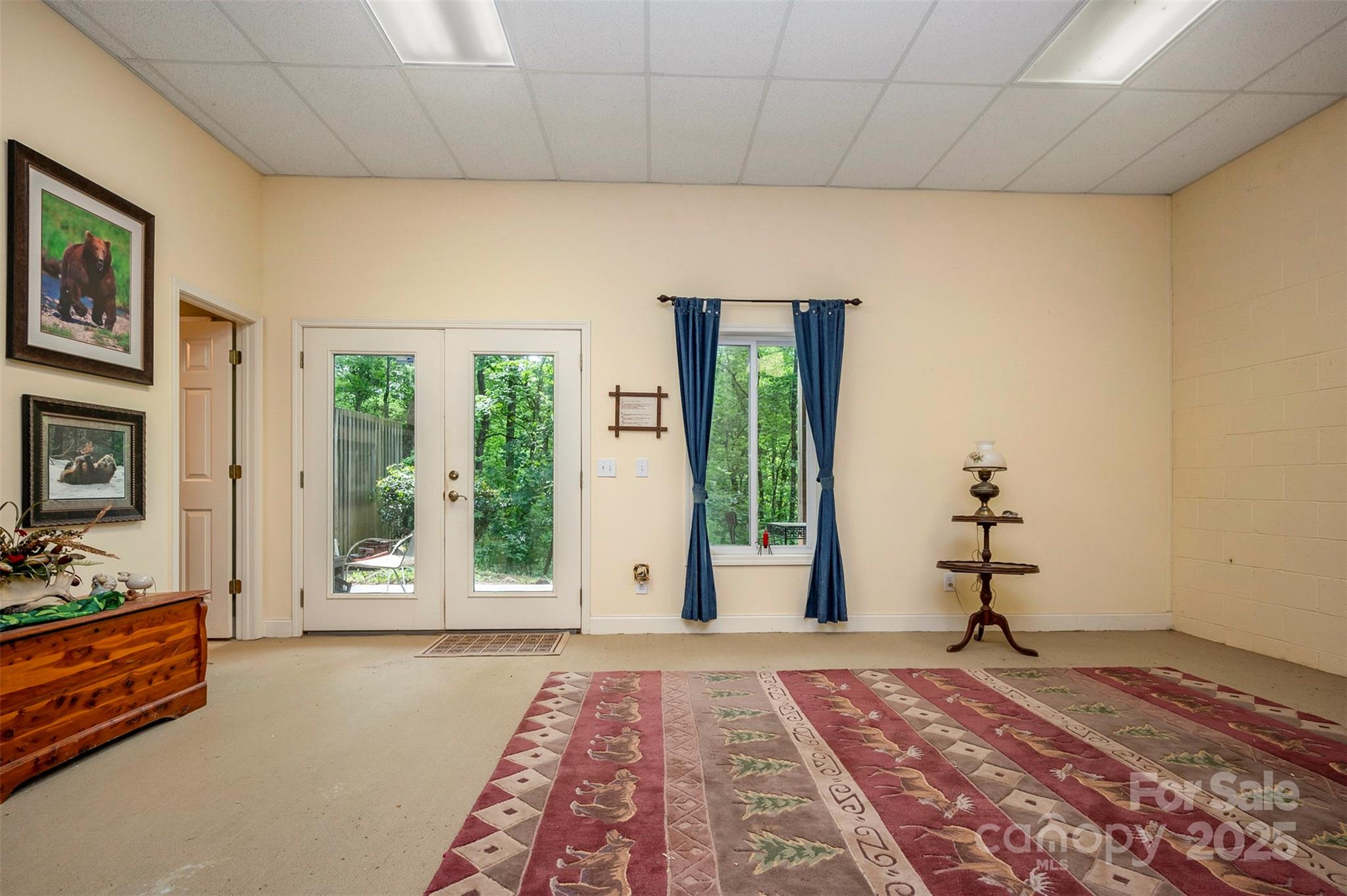 768 White Oak Lane Tryon, NC 28782 - Photo 30 of 48 a view of a bedroom with a bed and wooden floor
