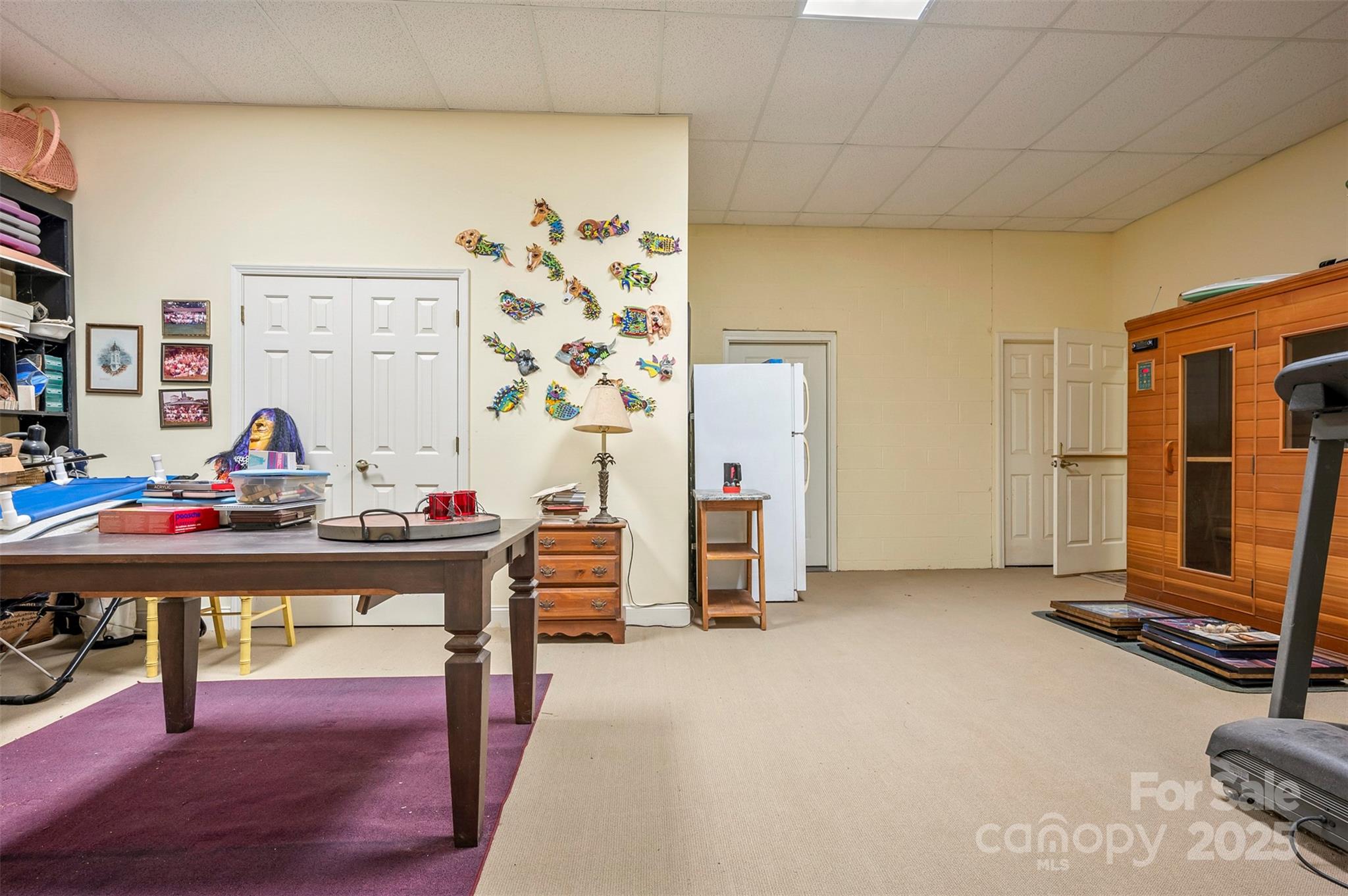 768 White Oak Lane Tryon, NC 28782 - Photo 31 of 48 a view of a workspace with furniture and a potted plant