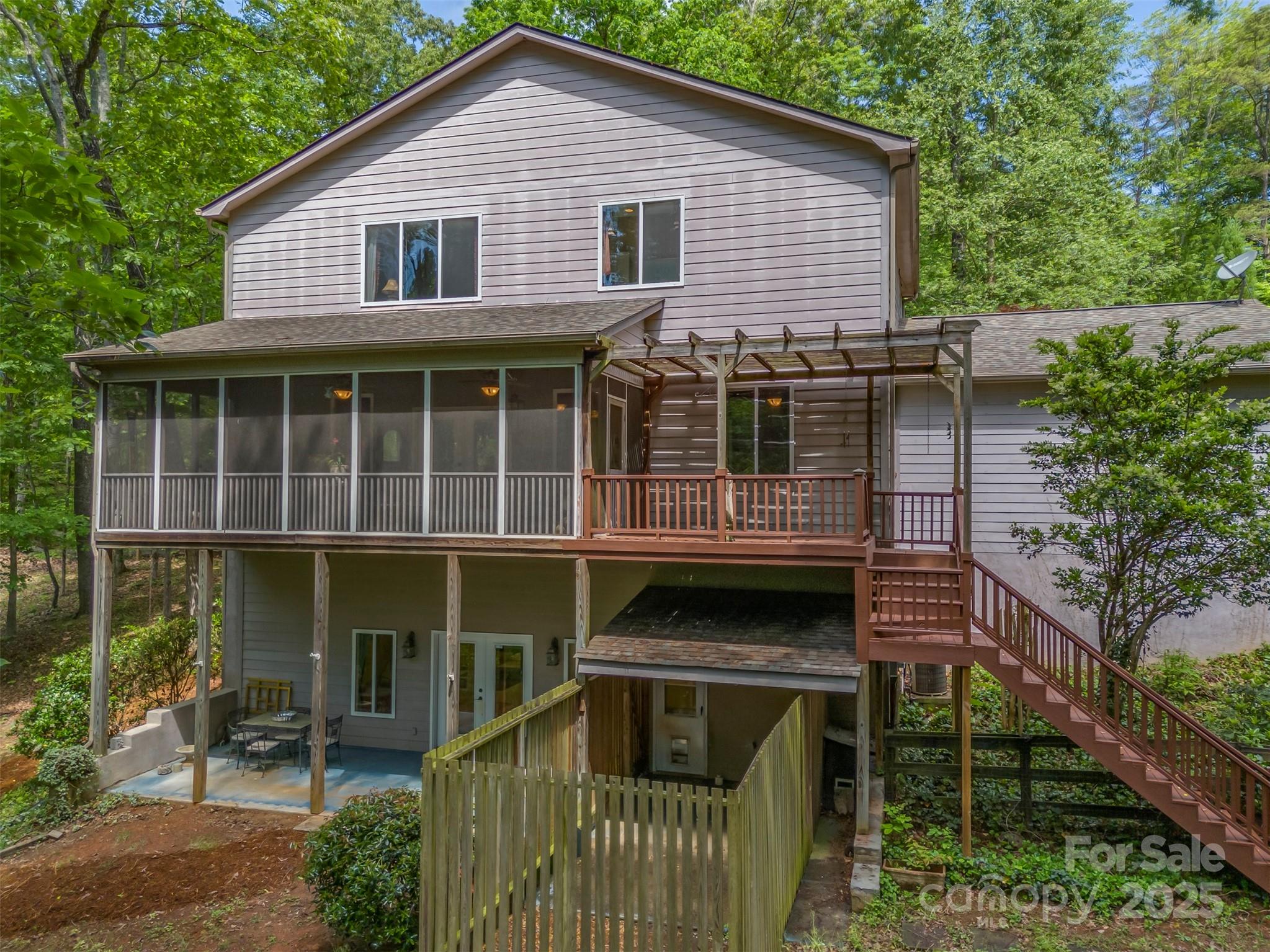 768 White Oak Lane Tryon, NC 28782 - Photo 39 of 48 a front view of a house with plants