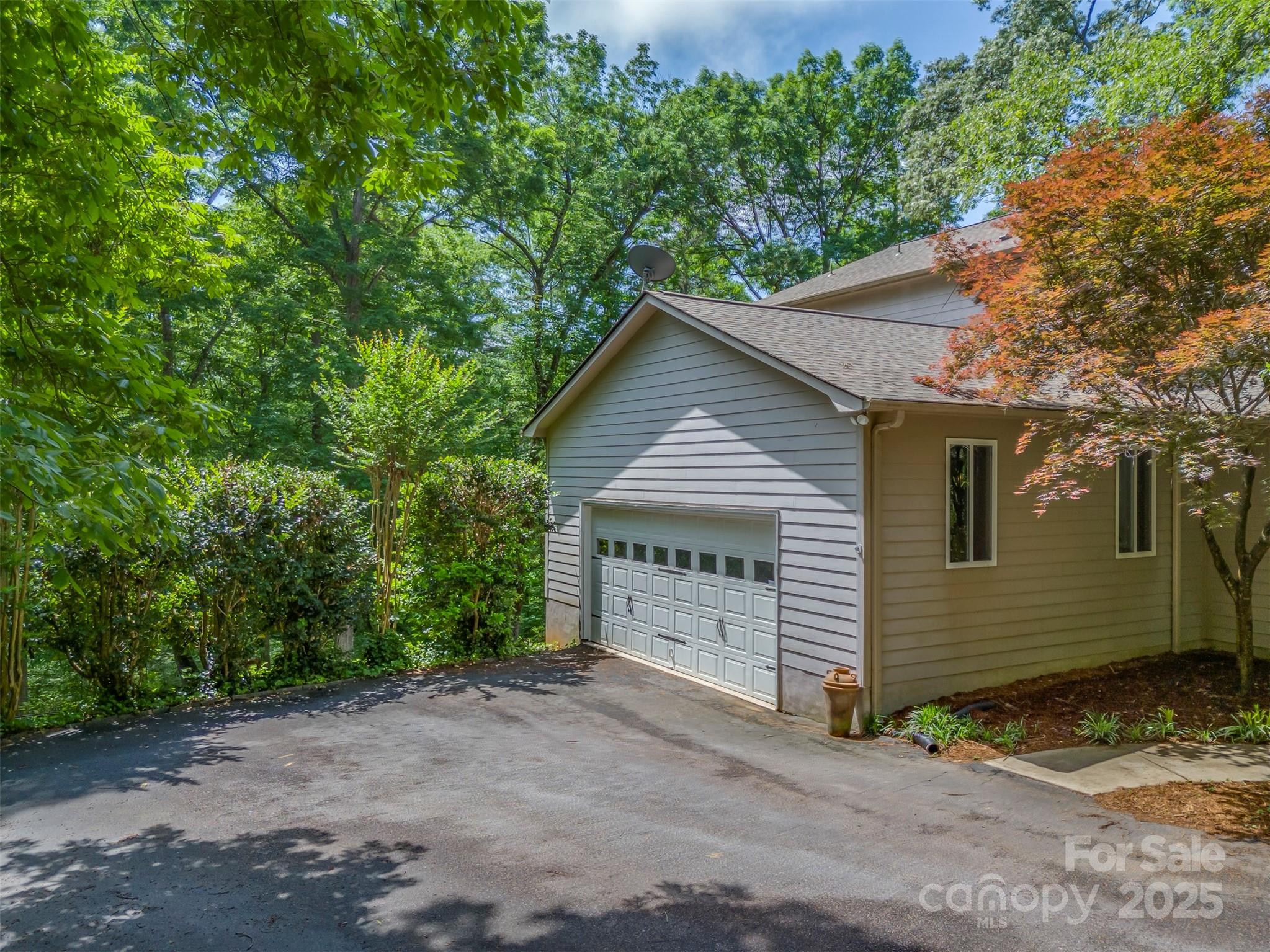 768 White Oak Lane Tryon, NC 28782 - Photo 40 of 48 a view of a house with a yard and tree s