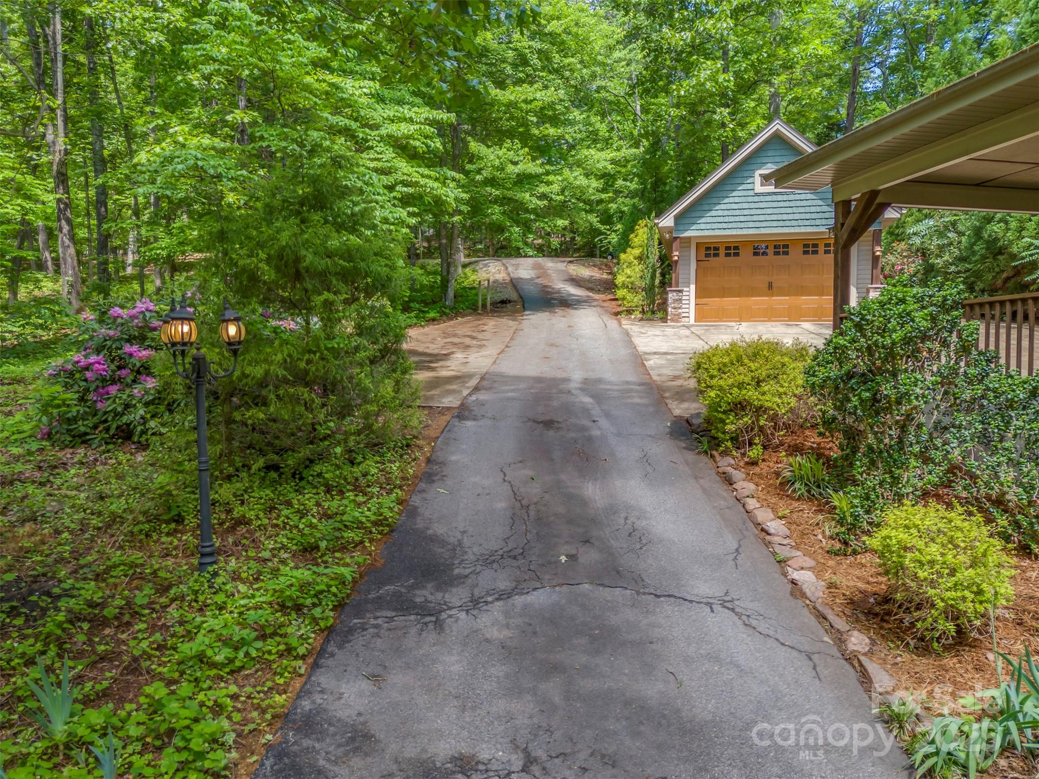 768 White Oak Lane Tryon, NC 28782 - Photo 41 of 48 a view of a back yard of the house