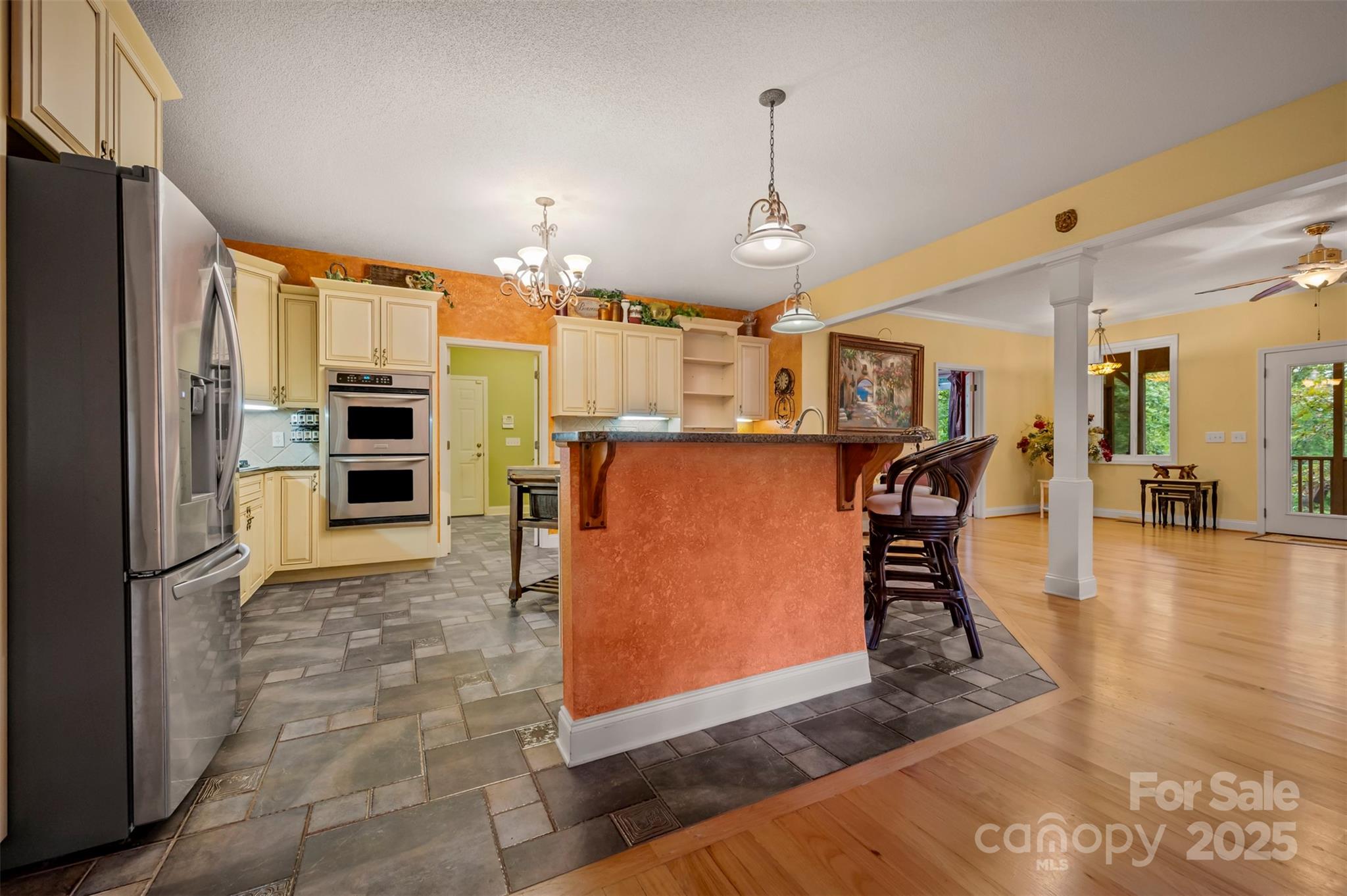 768 White Oak Lane Tryon, NC 28782 - Photo 8 of 48 a kitchen with stainless steel appliances granite countertop a refrigerator a oven and a sink