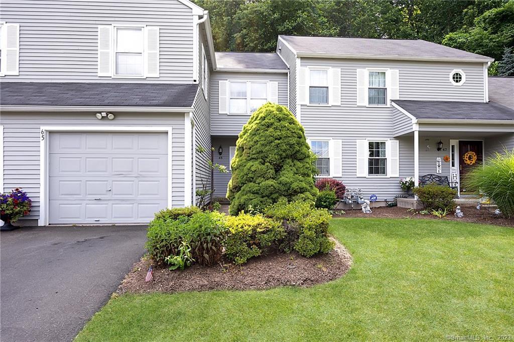 65 Quarry Village Road, Unit 65 Cheshire, CT 06410 - Photo 1 of 1 front view of a house with a yard