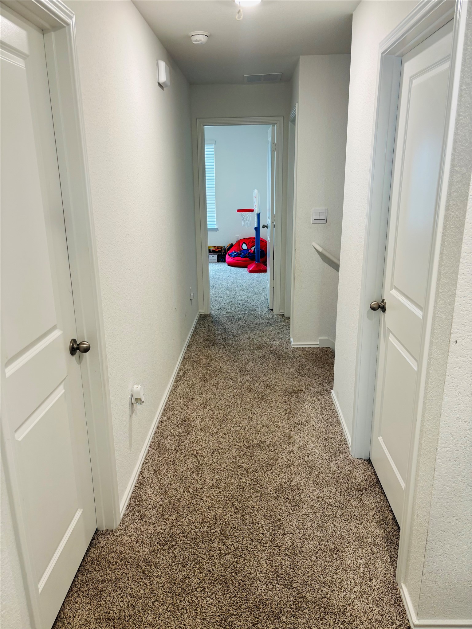 14817 Perlino Way, Unit A Manor, TX 78653 - Photo 13 of 40 a view of hallway with wooden floor