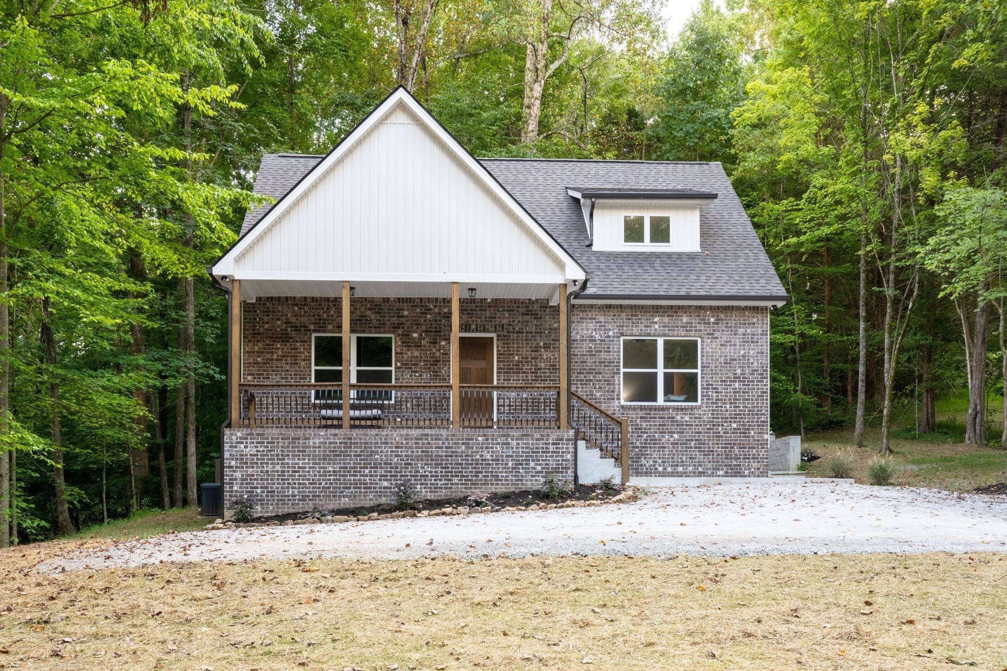 2 Hickory Hills Drive Dickson, TN 37055 - Photo 1 of 34 a front view of a house with garden