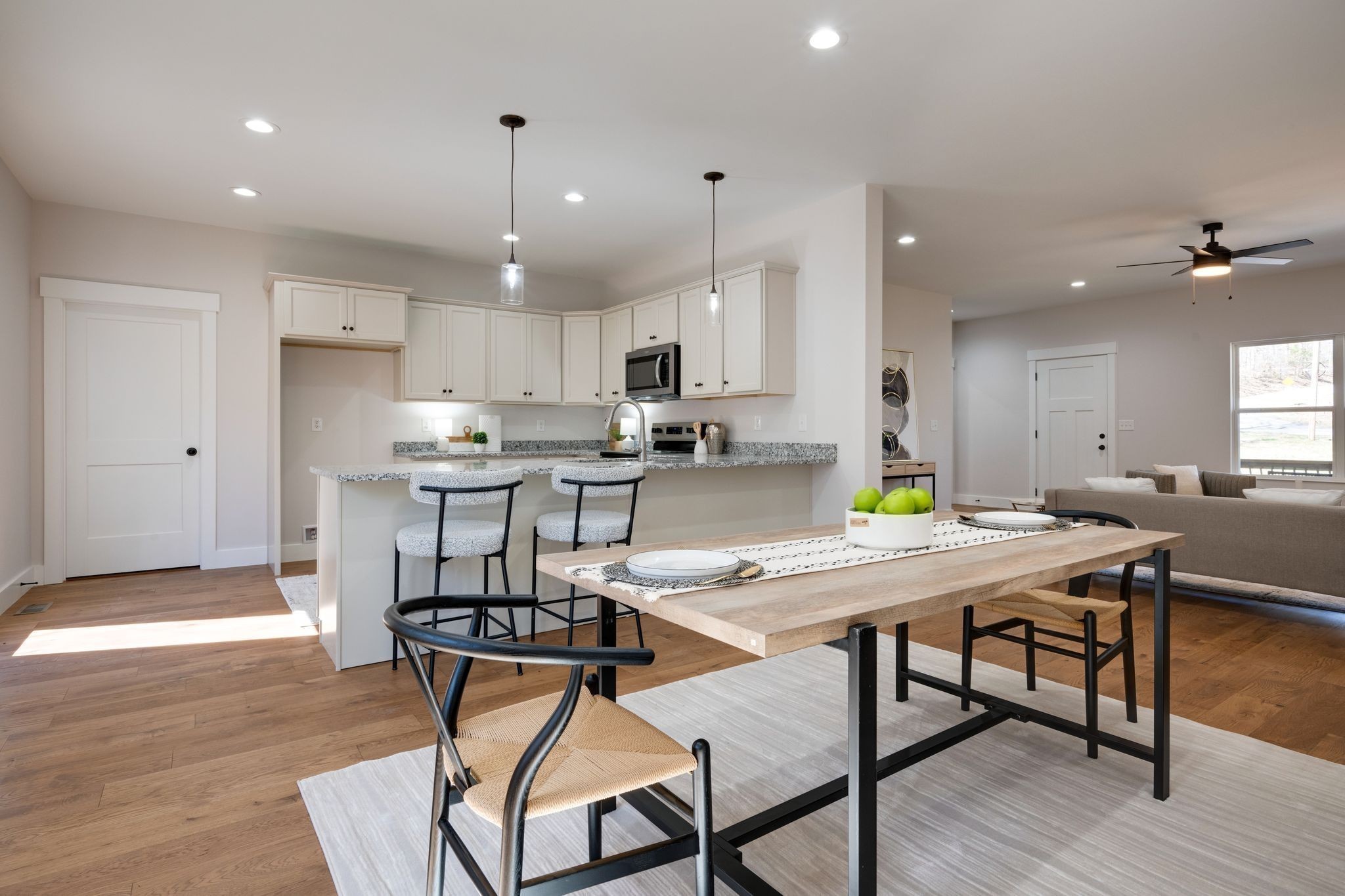 2 Hickory Hills Drive Dickson, TN 37055 - Photo 13 of 34 a kitchen with stainless steel appliances kitchen island granite countertop a dining table chairs and view living room