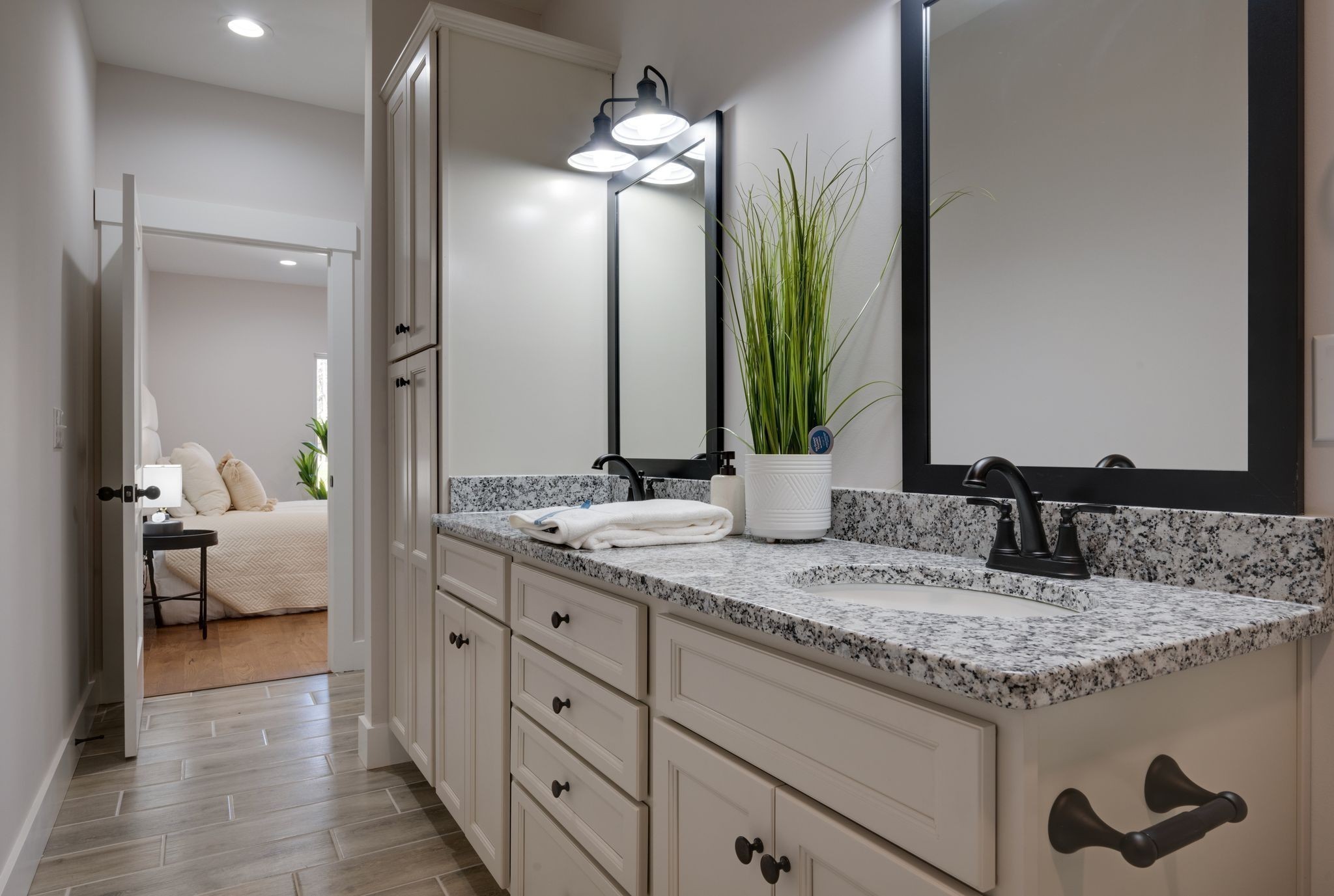 2 Hickory Hills Drive Dickson, TN 37055 - Photo 20 of 34 a en suite bathroom with a granite countertop sink and a mirror