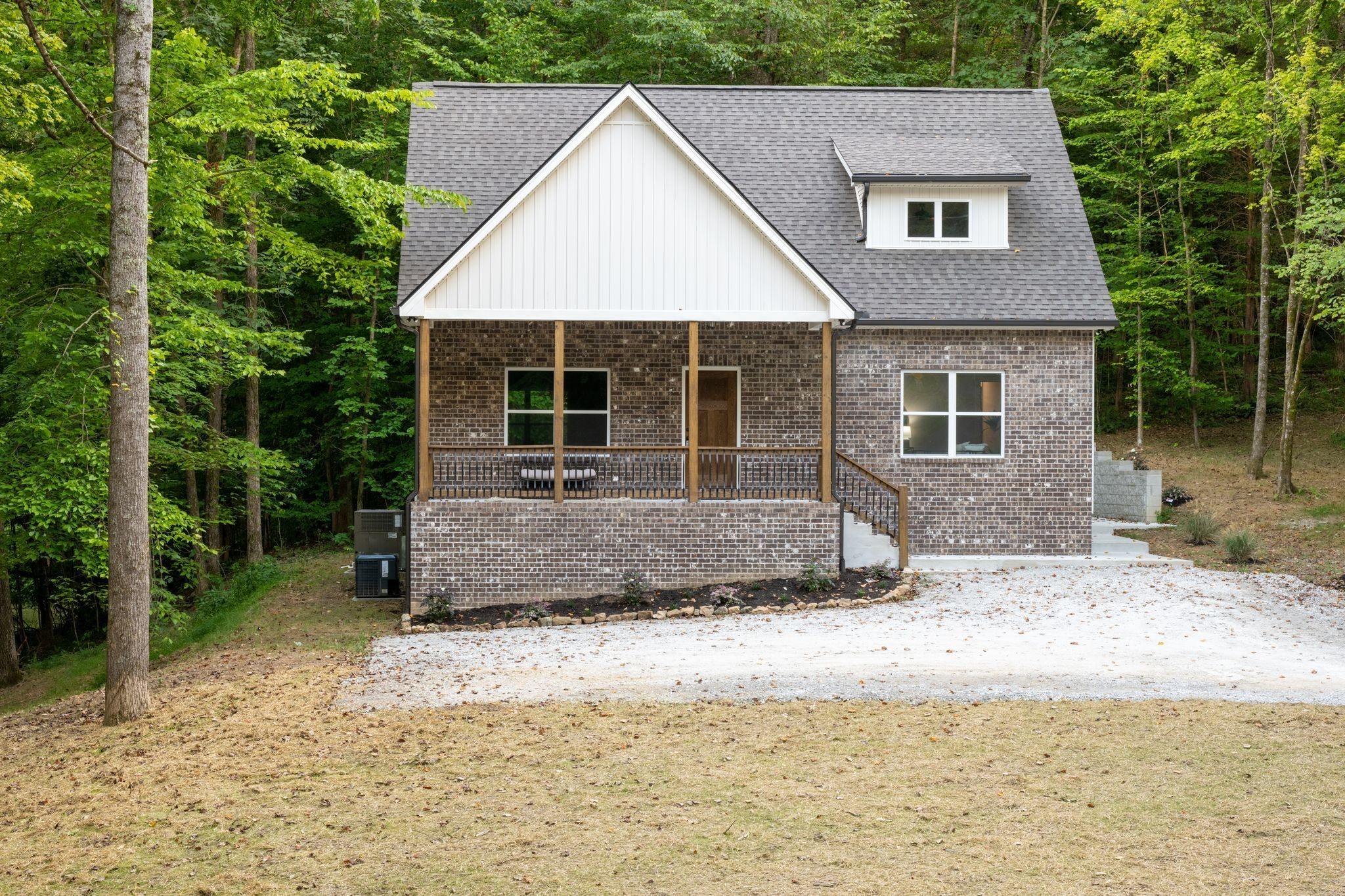 2 Hickory Hills Drive Dickson, TN 37055 - Photo 28 of 34 a front view of a house with a yard and garage