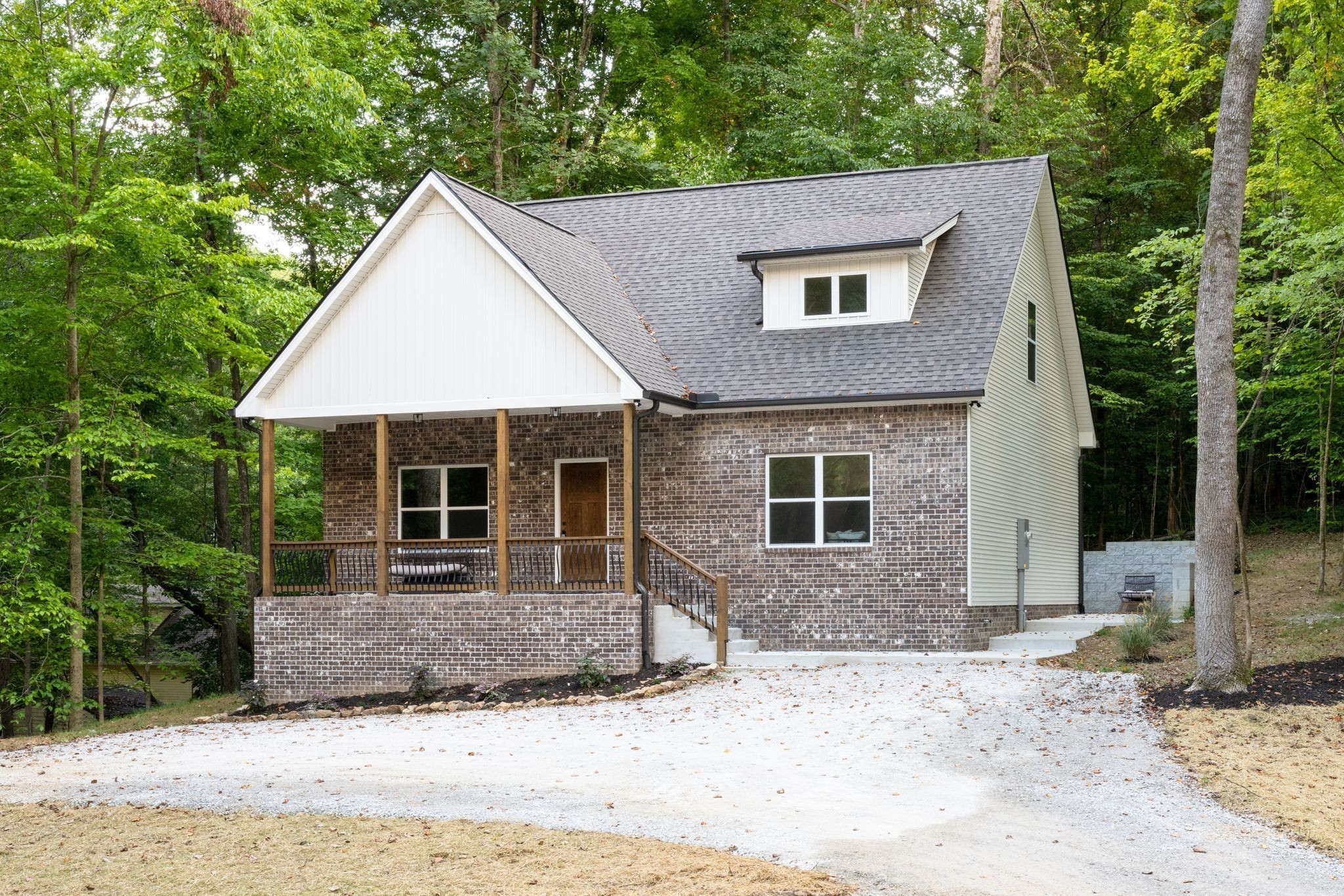 2 Hickory Hills Drive Dickson, TN 37055 - Photo 30 of 34 a front view of a house with garden