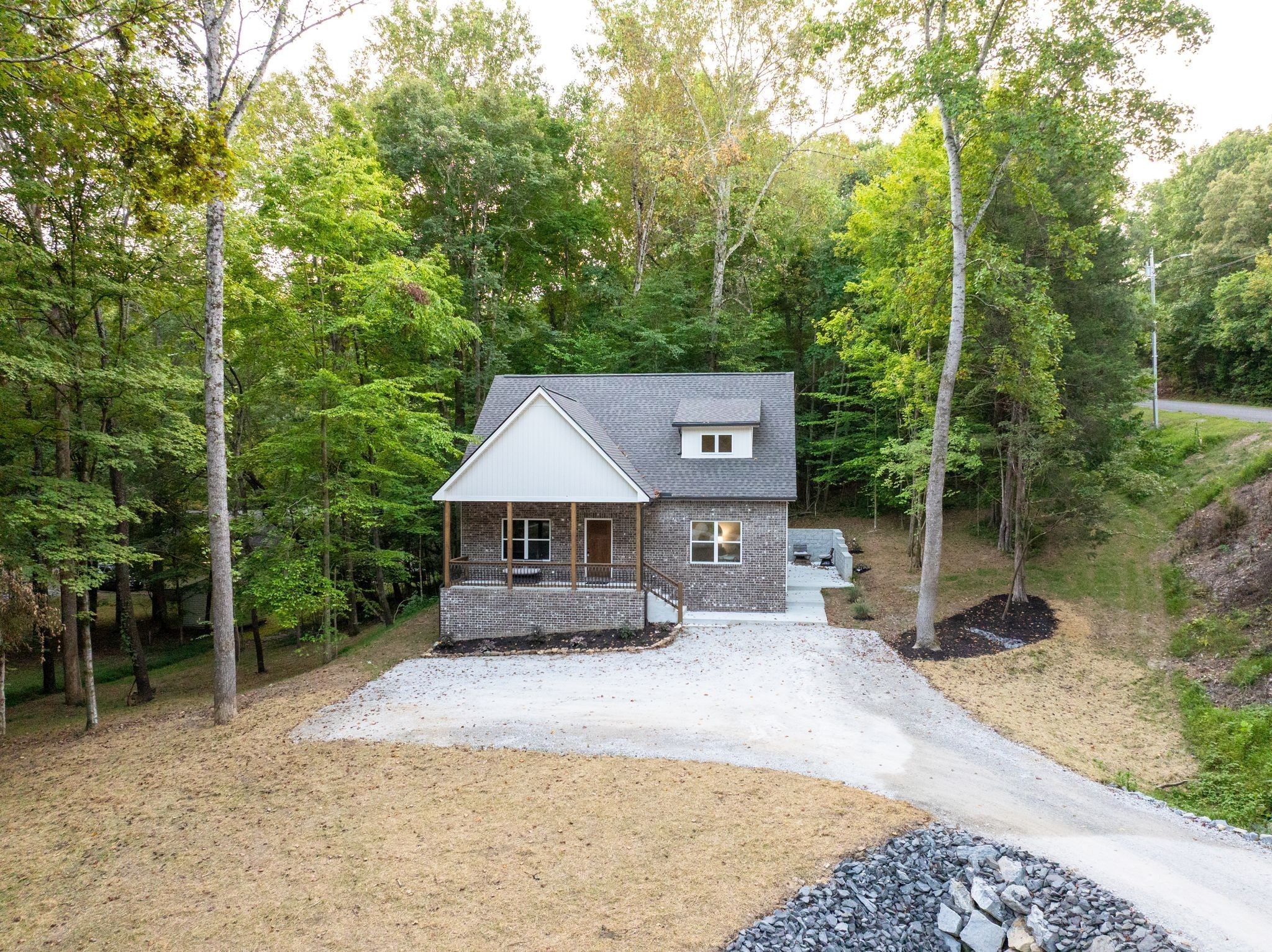 2 Hickory Hills Drive Dickson, TN 37055 - Photo 34 of 34 a front view of a house with a yard and trees