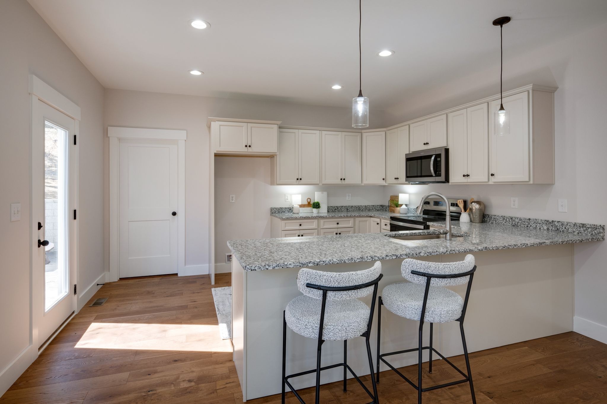 2 Hickory Hills Drive Dickson, TN 37055 - Photo 10 of 34 a kitchen with stainless steel appliances granite countertop a refrigerator a sink a stove a microwave and wooden cabinets