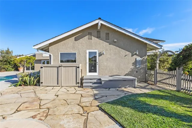 a view of a swimming pool and an outdoor seating