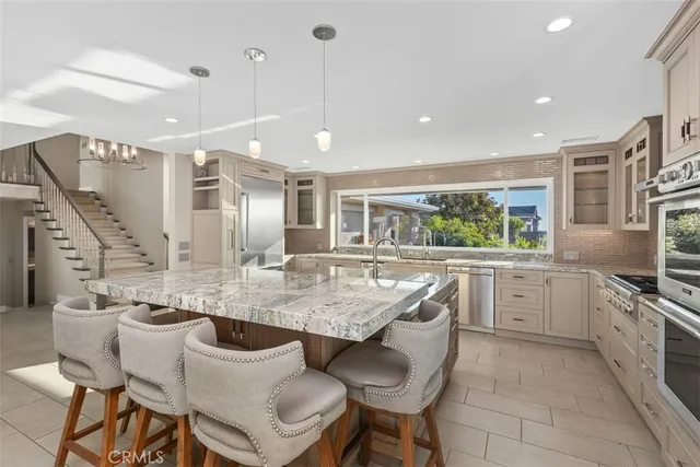 a kitchen with a sink counter top space and appliances