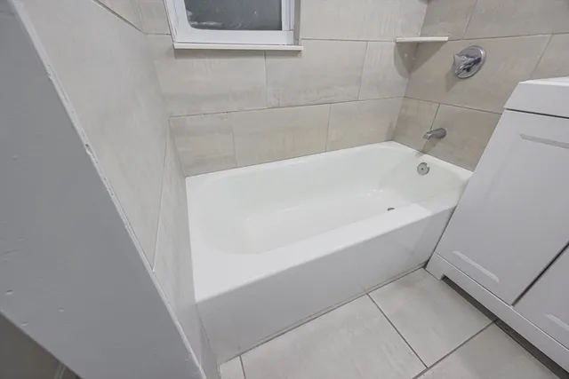 a bathroom with a bathtub