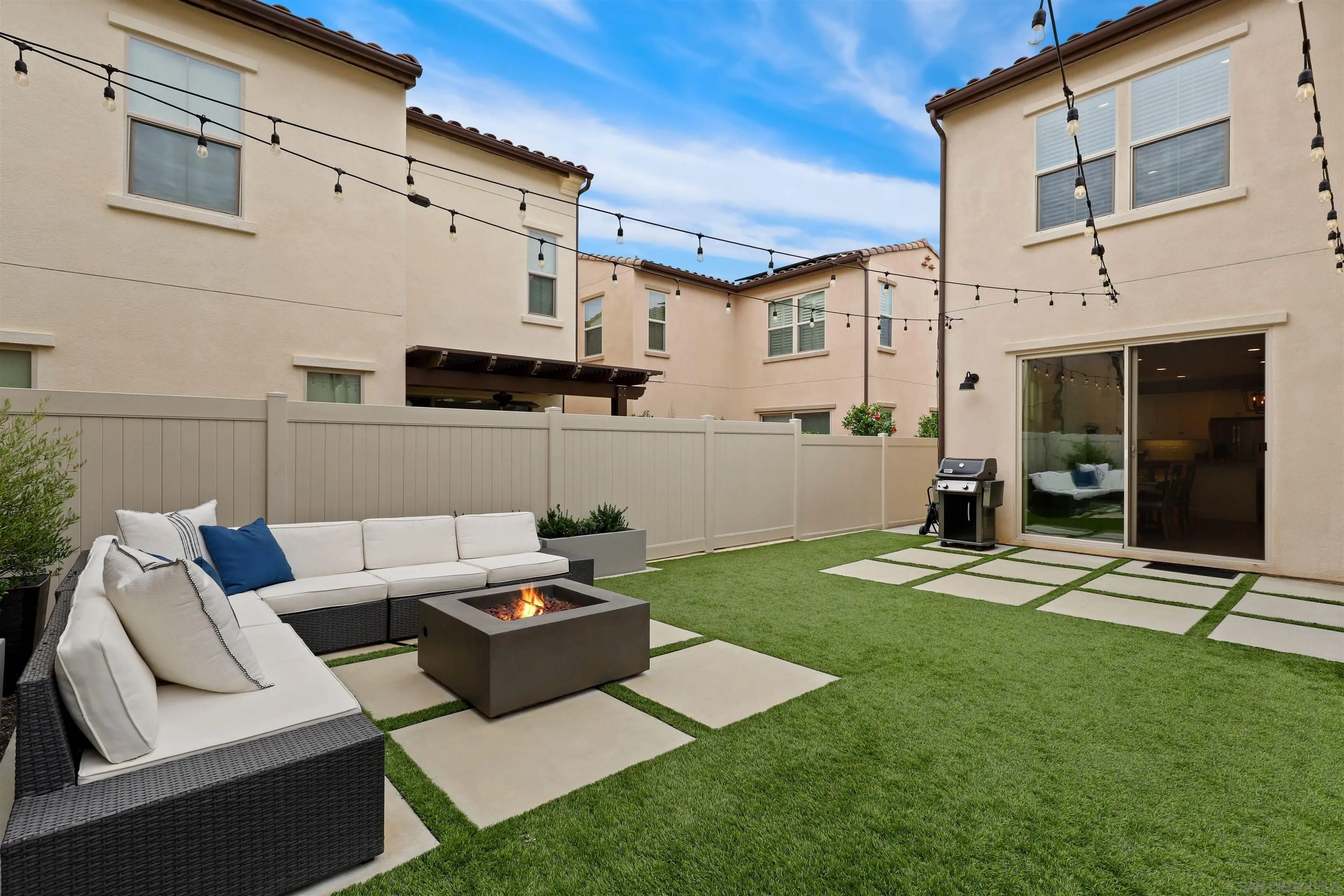 655 Gemstone Drive San Marcos, CA 92078 - Photo 35 of 48 a view of a patio with couches chairs and plants
