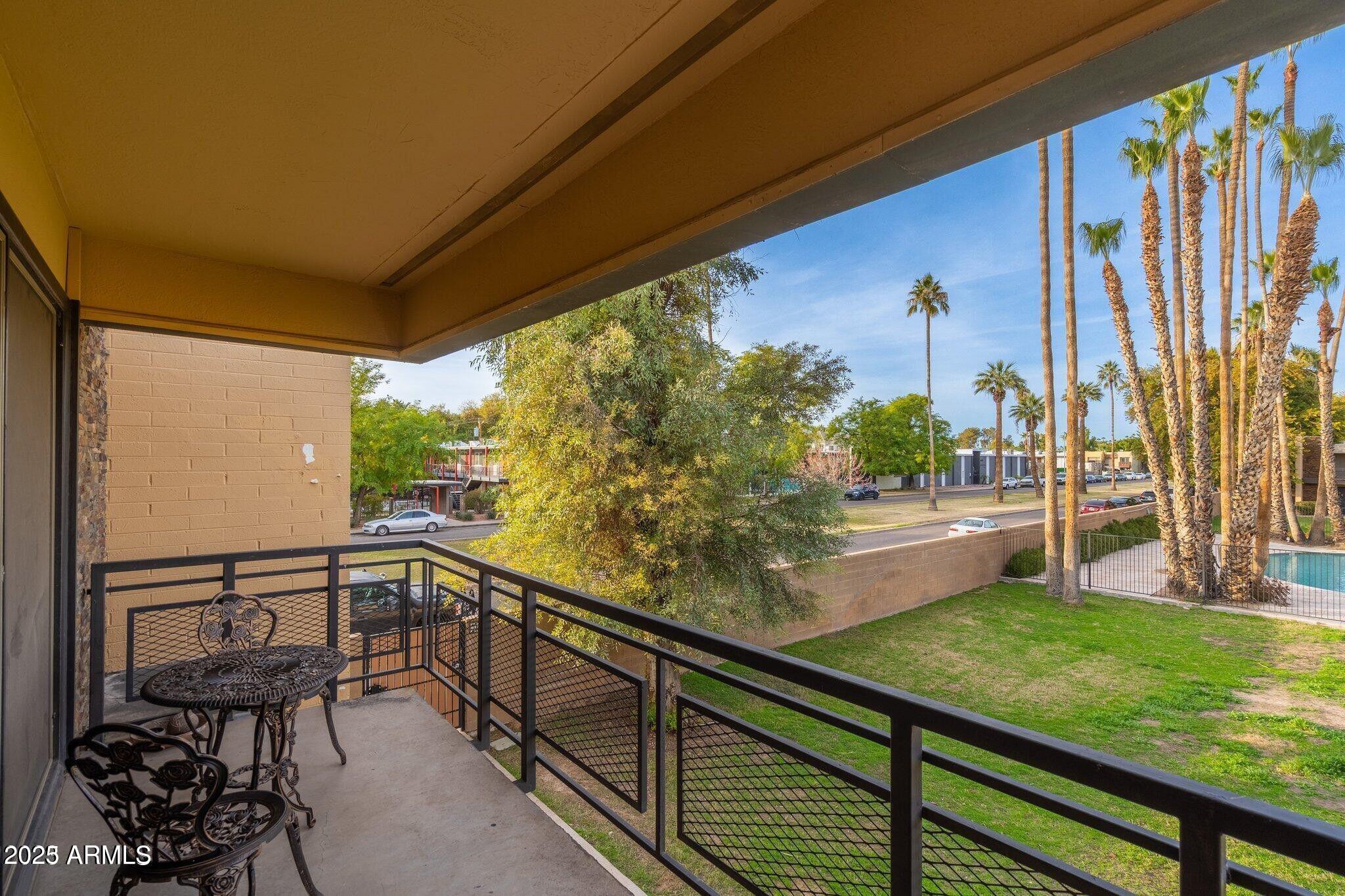 6501 North 17th Avenue, Unit 101 Phoenix, AZ 85015 - Photo 19 of 27 a view of two chairs in a patio