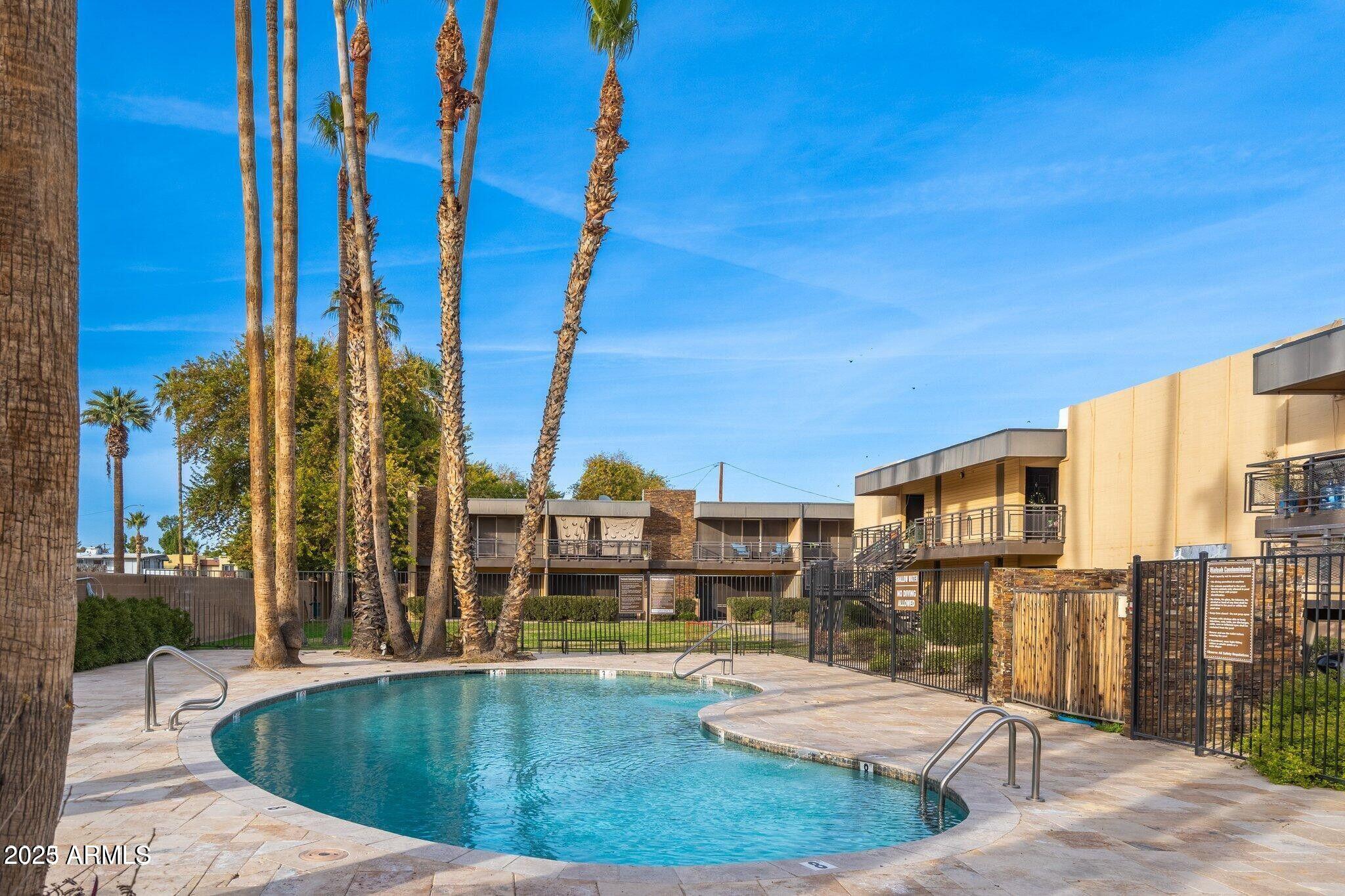 6501 North 17th Avenue, Unit 101 Phoenix, AZ 85015 - Photo 27 of 27 a view of outdoor space with swimming pool and seating