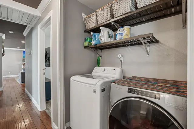 a utility room with dryer and washer
