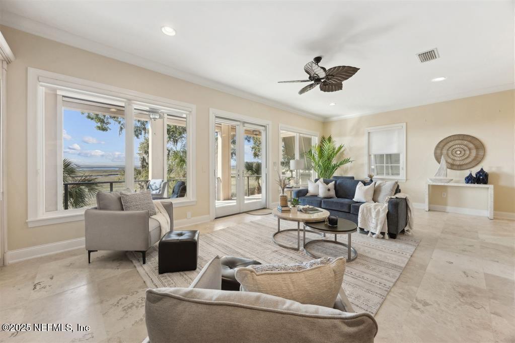 95178 Spring Tide Lane Fernandina Beach, FL 32034 - Photo 2 of 67 a living room with furniture and a large window