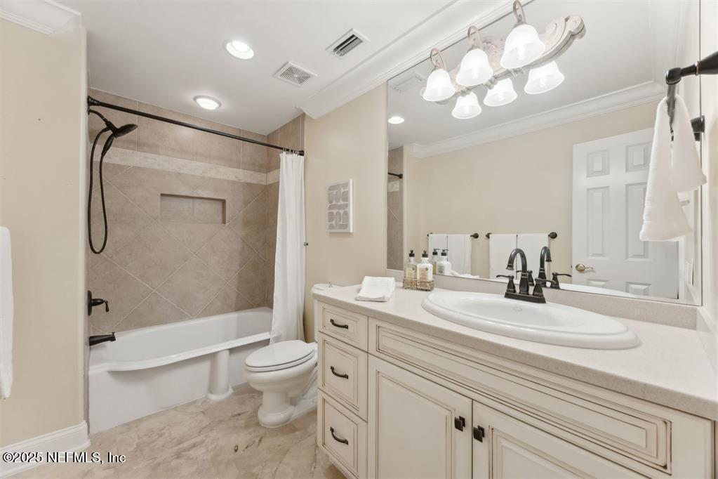 95178 Spring Tide Lane Fernandina Beach, FL 32034 - Photo 48 of 67 a bathroom with a sink a toilet and shower