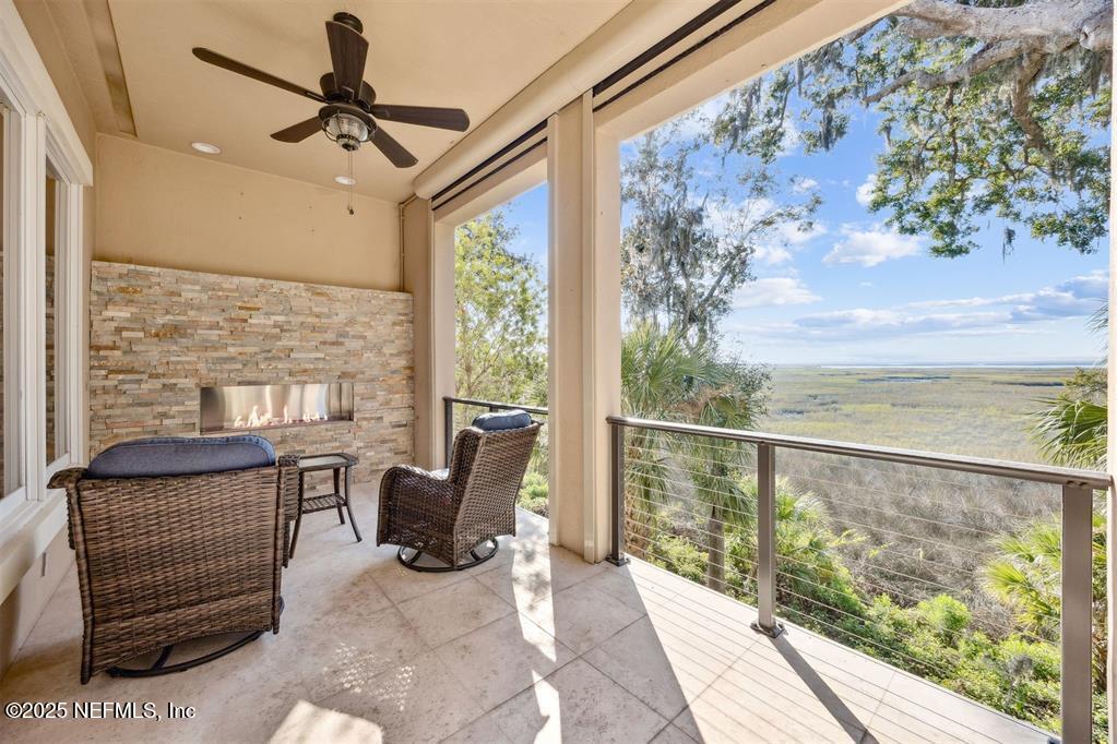 95178 Spring Tide Lane Fernandina Beach, FL 32034 - Photo 5 of 67 a view of a dining room with furniture window and outside view
